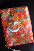 TURUNCU RENK DESENLİ CLUTCH ÇANTA